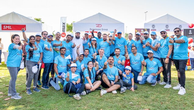 Teamfoto mit Mitarbeitenden der Dussmann Group beim Beat Diabetes Run in Dubai